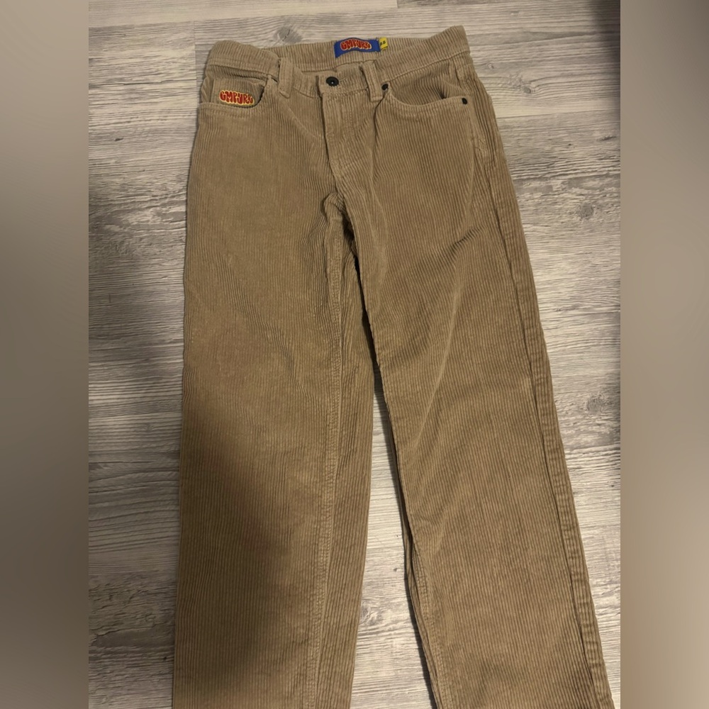 Corduroy pants like new slightly worn with an empire logo on front and back